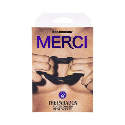 Packaging of Merci Silicone Covered Metal Cock Ring 35mm in black with hands stretching the ring on a bare chest background.