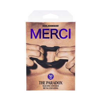 Packaging of Merci silicone-covered metal cock ring showing hands stretching the black ring against bare skin background.