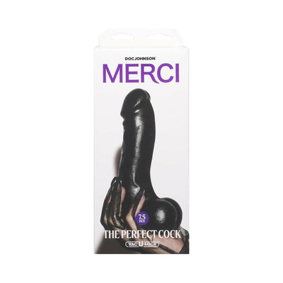 Packaging of Merci The Perfect Cock 7.5-inch black dildo with Vac-u-lock suction cup, held by a hand with black gloves.