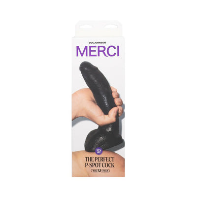 Packaging of Merci The Perfect P-Spot Cock in black with hand holding the product, highlighting its size and texture.