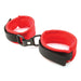 Red mink faux fur handcuffs with adjustable black straps and sturdy metal connectors on a white background.