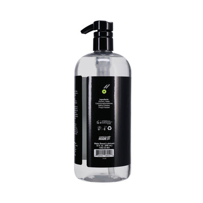 Clear 32 oz pump bottle of Mood Lube Water-Based lubricant with black label and ingredients list visible on the back.