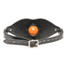 Black adjustable vegan leather mouth gag with central round orange insert and metal buckle closure.