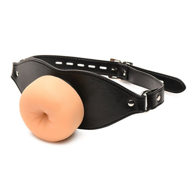 Adjustable black vegan leather strap gag with a realistic flesh-toned soft TPE front piece.