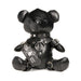 Black vegan leather teddy bear dressed in detailed gimp harness and collar with metal buckles and studs.