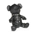 Black vegan leather teddy bear dressed in detailed gimp harness with silver studs and buckles.