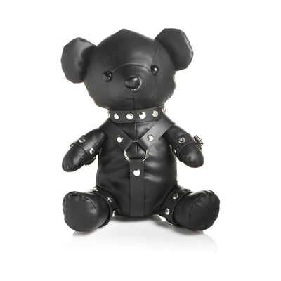 Black vegan leather teddy bear dressed in detailed gimp harness and collar with silver studs and rings.