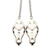 Silver metal Ms Primal Spiked Clover Nipple Clamps with 12-inch chain and black spiked rubber tips on white background.