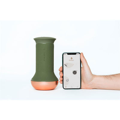 MYHIXEL TR device in olive green with copper base next to a hand holding a smartphone displaying the MYHIXEL app interface.