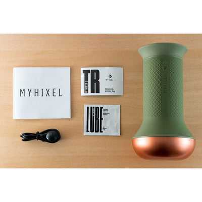 MYHIXEL TR device in green with copper base, USB charging cable, lubricant sample, and user manuals on wooden surface.
