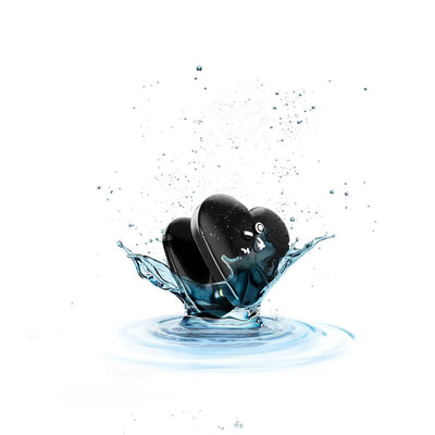 Black heart-shaped Mystim Hearts Desire eStim vibrator splashing in clear water on white background.
