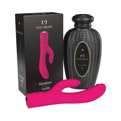 Pink dual-action Mystique Rabbit vibrator with textured black storage bottle and branded packaging box.