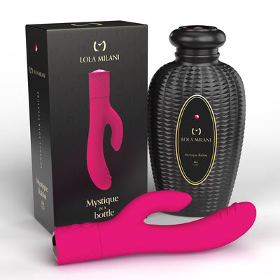 Pink Mystique Rabbit vibrator with textured black storage bottle and matching black and gold packaging box.