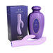 Lavender double-action vibrator with textured handle, shown with purple decorative storage bottle and matching packaging box.