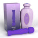 Lola Milani Mystique Wand in purple with textured protective bottle and matching packaging box.