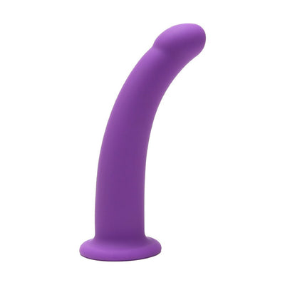 Purple curved silicone dildo with smooth texture and flared base, standing upright on a white background.