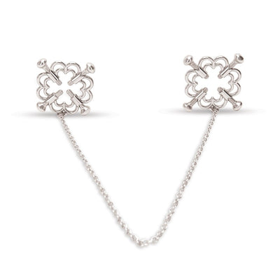 Silver flower-shaped adjustable nipple clamps connected by a delicate chain for stylish and customizable wear.