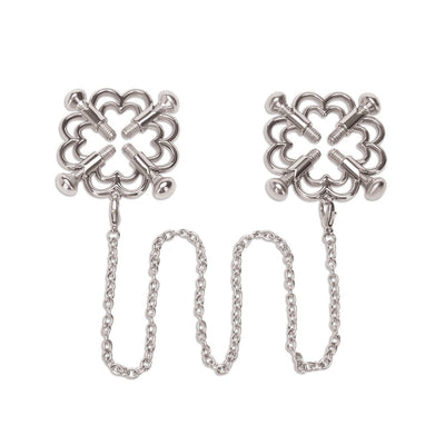 Silver flower-shaped nipple clamps connected by a delicate chain with adjustable screw grips.