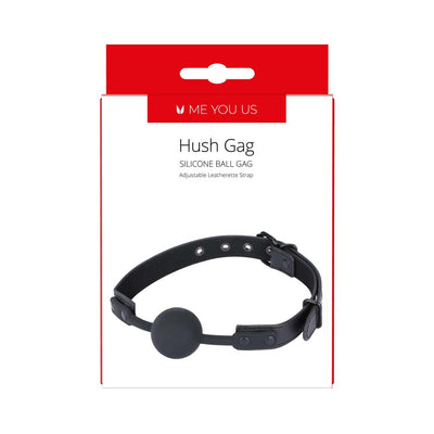 Packaging of Me You Us Hush Gag with black silicone ball and adjustable leatherette strap displayed on white background.