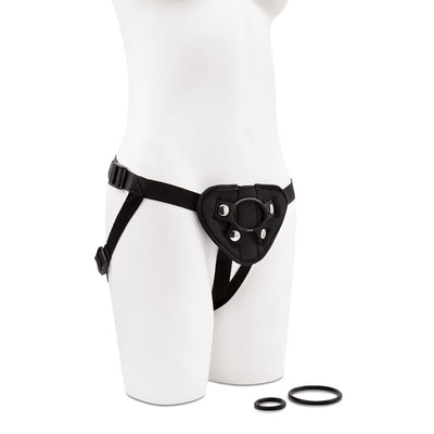 Black adjustable strap-on harness displayed on a white mannequin with two interchangeable O-rings beside it.