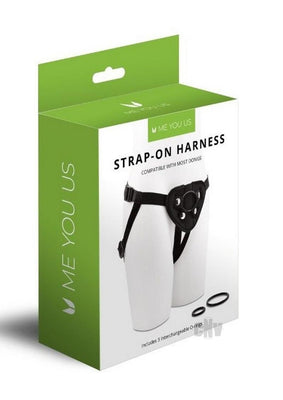 Packaging of Me You Us black strap-on harness with adjustable straps and three interchangeable O-rings shown on a mannequin.