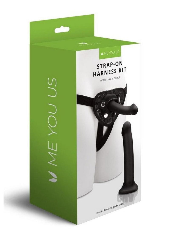 Packaging of Me You Us strap-on harness kit featuring black harness and two interchangeable dildos in 6 and 8 inch sizes.