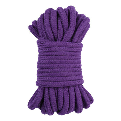 Coiled 10-meter purple cotton rope designed for comfortable and versatile bondage play.