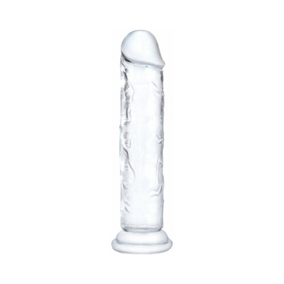 Transparent flexible dildo with flared base and realistic texture standing upright on white background