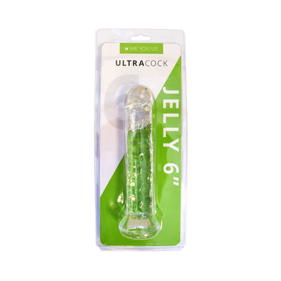 Clear 6-inch flexible dildo with flared base in green jelly material, packaged in a green and white blister pack.