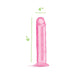 Pink translucent flexible dildo with flared base, measuring 6 inches long and 4 inches wide.