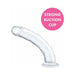Clear flexible dildo with realistic shape and strong suction cup base for hands-free use.