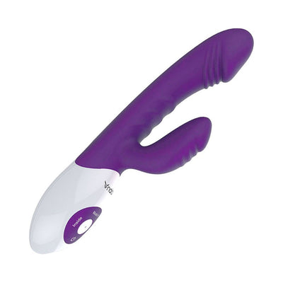 Purple and white dual-stimulation vibrator with ergonomic design and control buttons on the handle.