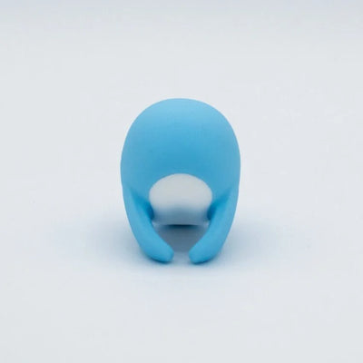 Blue whale-shaped finger vibrator with a smooth, curved design and white accent on a white background.
