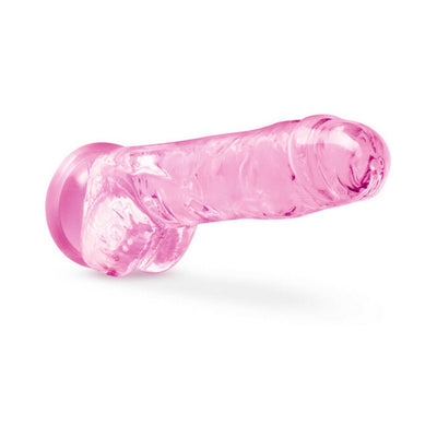 Translucent pink 8-inch realistic dildo with suction cup base, textured for lifelike feel and versatile use.