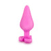 Pink silicone anal plug with heart-shaped base and smooth satin finish for comfortable, safe use.