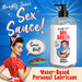 Bottle of Naughty Jane's Sex Sauce natural water-based personal lubricant with retro woman in red polka dot dress holding a pie.