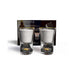 Set of two white massage candles in clear shot glass holders with 24K gold leaf accents and gold rims, displayed with packaging.