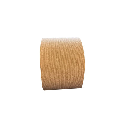 Roll of honey-colored Neva Nude Boob Tape with textured surface for discreet support and lift.
