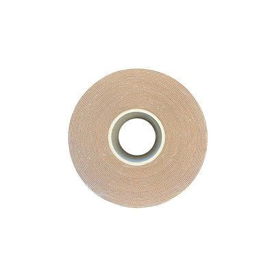 Roll of honey-colored Neva Nude boob tape with a smooth texture on a white background.