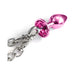 Medium-sized pink metal butt plug with sparkling jewel base attached to silver chain clasps.