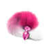 Pink metallic tapered butt plug with a long ombre faux fur tail in shades of pink and white.