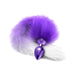 Metallic purple tapered butt plug with a soft ombre faux fur tail in shades of purple and white.