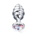 Small ribbed metal plug with tapered spiral design and a flared base featuring a multicolored jewel accent.