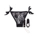 Black lace pleasure panty with side ties, paired with a sleek bullet vibrator and remote control.