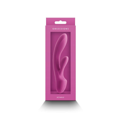Dark pink Obsession Bonnie silicone vibrator in sleek packaging with clear window display.