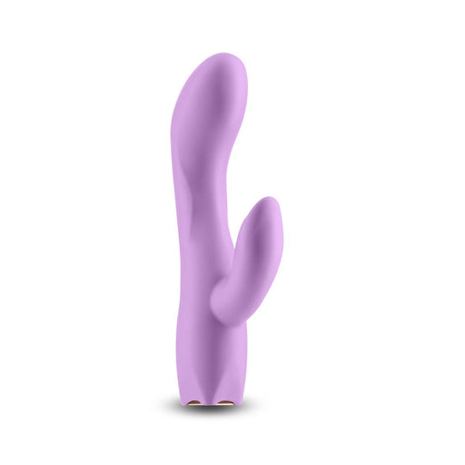 Light purple silicone dual-stimulation vibrator with curved design and smooth finish.