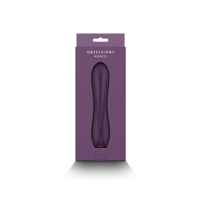 Obsession Romeo vibrator in dark purple displayed in matching purple packaging with clear window.
