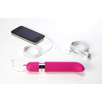 Pink OhMiBod Freestyle G-Spot vibrator connected to a smartphone with white earphones on a white background.