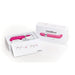 OhMiBod Freestyle G-Spot massager in pink with remote control and charger, displayed in open packaging next to product box.