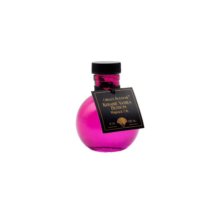 Round pink bottle of Olivia's Boudoir Kissable Vanilla Blossom massage oil with black cap and label tag.